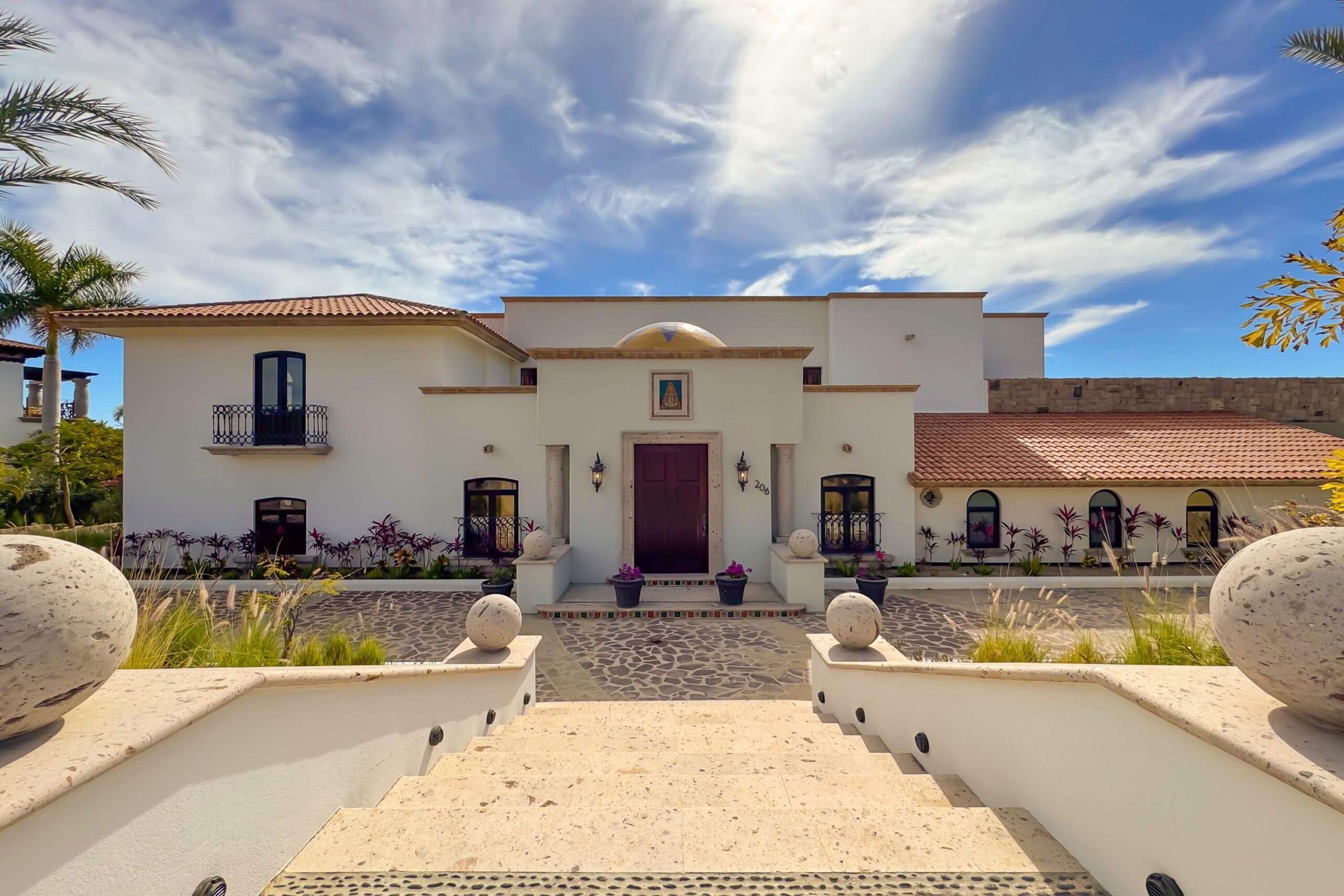Puerto Los Cabos Fundadores Step into Villa Andaluz where Old-World romance meets Mexican charm. This sprawling 12,000+ AC sq.ft. estate redefines the classic Mexican hacienda. Centered around a lush, tiled courtyard with a tranquil stone fountain, this 7-bedroom, 9-bathroom villa offers an expansive floor plan designed for seamless indoor-outdoor living.The heart of the home features a grand living room with ocean for sale