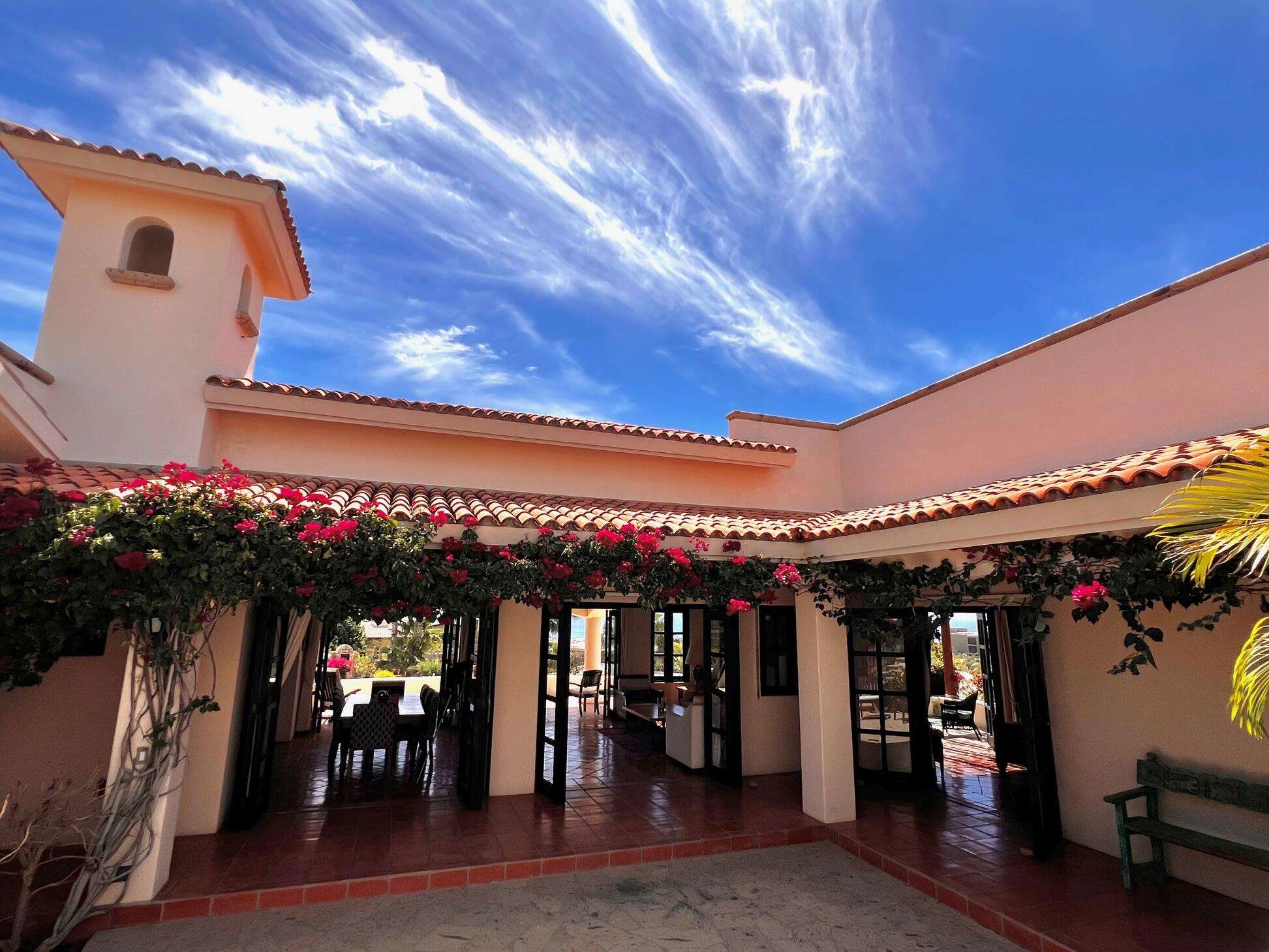Puerto Los Cabos La Noria One of the first homes built in La Noria, within the amenity rich development of Puerto Los Cabos, this very unique two bedroom, two bath home, followed the Hacienda style's original design guidelines, with a large entry courtyard, rooms to the sides and opening to the main living area, kitchen and outdoor patio/deck.The initial concept and plans were designed with a third bedroom in mind, to be built at a different time, yet the functionality of the two bedroom house ended up suiting its owners well and thus house did not grow within the still remaining buildable area of the homesite.Subsequently, a second design concept was planned, to build a second level master bedroom with panoramic for sale